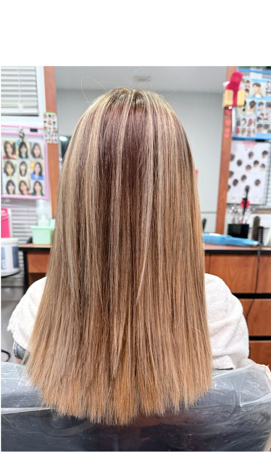 Warm balayage on long straight hair at Simple Cuts Framingham by Hannah